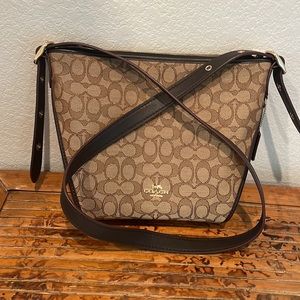 Authentic Coach shoulder bag in classic jacquard print.